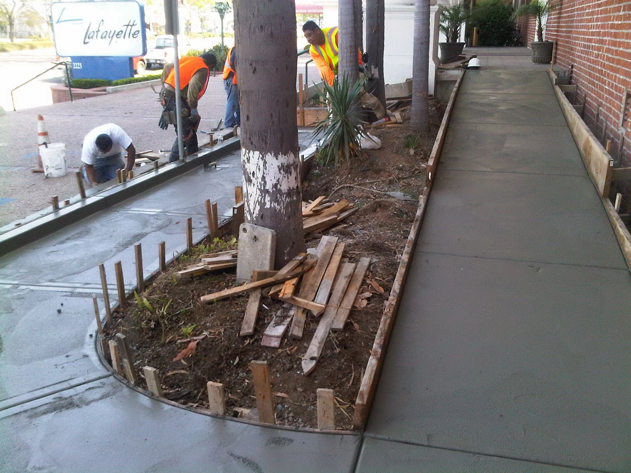 Sidewalk construction workers